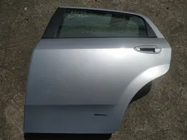 Fiat Punto (188) Portiera posteriore pilkos