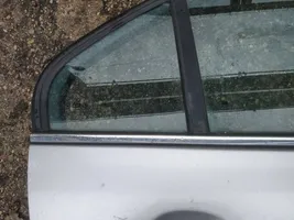 Chevrolet Epica Galinių durų stiklo apdaila 