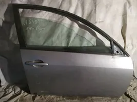 Nissan Primera Drzwi przednie pilkos