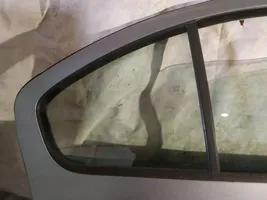 Skoda Octavia Mk2 (1Z) Szyba karoseryjna drzwi tylnych 