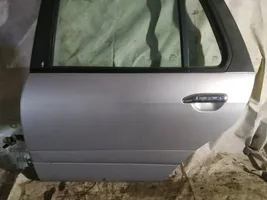 Nissan Primera Rear door pilkos