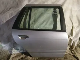 Nissan Primera Puerta trasera pilkos