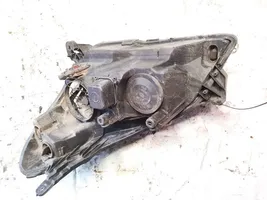 Opel Astra H Lampa przednia 153874