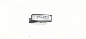 Volkswagen Golf VII Lampa oświetlenia tylnej tablicy rejestracyjnej 1K8943021