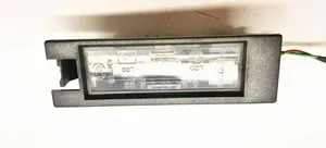 Opel Astra H Lampa oświetlenia tylnej tablicy rejestracyjnej 13139990