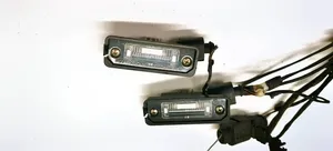 Volkswagen PASSAT B6 Lampa oświetlenia tylnej tablicy rejestracyjnej 1J6943021B