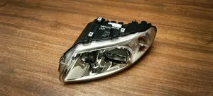 Chrysler Voyager Lampa przednia 04857703AB