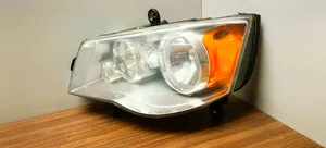 Chrysler Town & Country V Lampa przednia 05113337AE