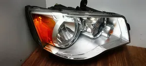 Chrysler Town & Country V Lampa przednia 05113340AE