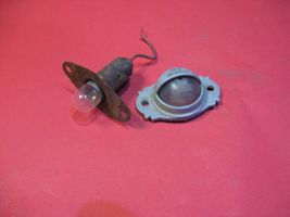 Mazda 323 F Lampa oświetlenia tylnej tablicy rejestracyjnej 0088079