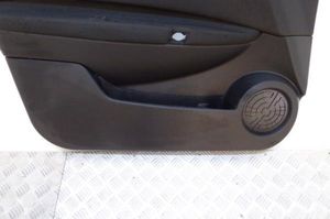 Nissan Qashqai+2 Boczki / Poszycie drzwi przednich 