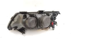 Saab 9-3 Ver2 Lampa przednia 15582600