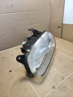 Mazda 323 F Lampa przednia 11061708