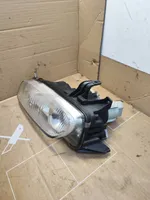 Mazda 323 F Lampa przednia 11061708