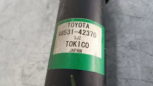 Toyota RAV 4 (XA40) Takaiskunvaimennin kierrejousella 4853142370