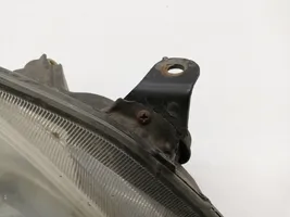 Toyota Corolla E120 E130 Lampa przednia 8111002150