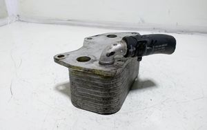 Volkswagen Jetta V Supporto di montaggio del filtro dell’olio 07K117021B