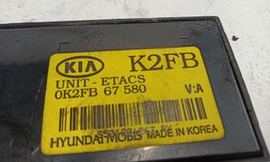 KIA Carens I Komforto modulis 0K2FB67580