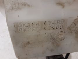 KIA Carens I Langų skysčio bakelis 0K2FA67480