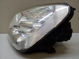 KIA Carens II Lampa przednia 921011D0