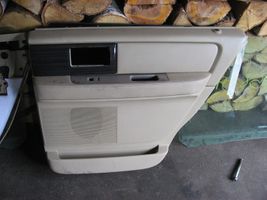Lincoln Navigator Garniture panneau de porte arrière 7L747827406AB