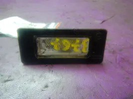 Skoda Fabia Mk2 (5J) Lampa oświetlenia tylnej tablicy rejestracyjnej 8T0943021