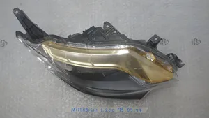 Mitsubishi L200 Lampa przednia L200R0997