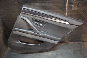 BMW 5 F10 F11 Apmušimas galinių durų (obšifke) 