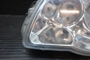 Chrysler Voyager Headlight/headlamp 04857831AC