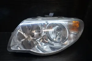 Chrysler Voyager Lampa przednia 04857831AC
