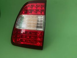 Toyota Land Cruiser (J100) Lampy tylnej klapy bagażnika 8158060130