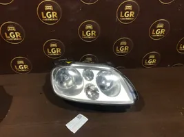 Volkswagen Touran I Lampa przednia 1305235778