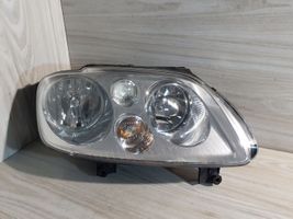 Volkswagen Touran I Lampa przednia 0301205202