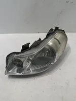 Suzuki SX4 Lampa przednia 10016684