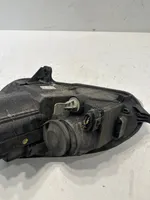 Volkswagen Golf V Lampa przednia 1K6941006R