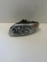 Chrysler Voyager Lampa przednia 04857703AB