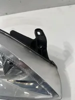 Opel Corsa C Lampa przednia 13115007