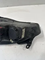 Opel Corsa C Lampa przednia 13115007