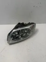 Chrysler Voyager Lampa przednia 04857703AB