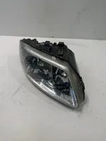 Chrysler Voyager Lampa przednia 04857702AB