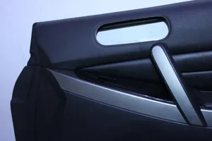 Mazda CX-7 Garniture de panneau carte de porte avant 