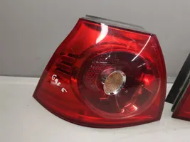 Volkswagen Golf V Lampy tylne / Komplet 1K6945095E