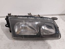 Mazda 626 Parapolvere per faro/fanale 1305239069