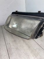 Volkswagen PASSAT B5 Lampa przednia 205080RS