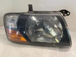 Mitsubishi Pajero Sport I Lampa przednia 12V6055W