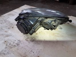 Volkswagen Golf V Lampa przednia 1K6941005Q