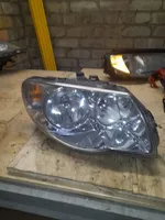 Chrysler Voyager Headlight/headlamp 04857830AC