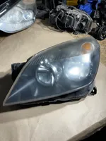 Opel Astra H Lampa przednia 1EG27037001