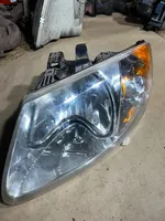 Chrysler Voyager Lampa przednia 073341103