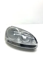 Volkswagen Golf V Lampa przednia 1K6941006R